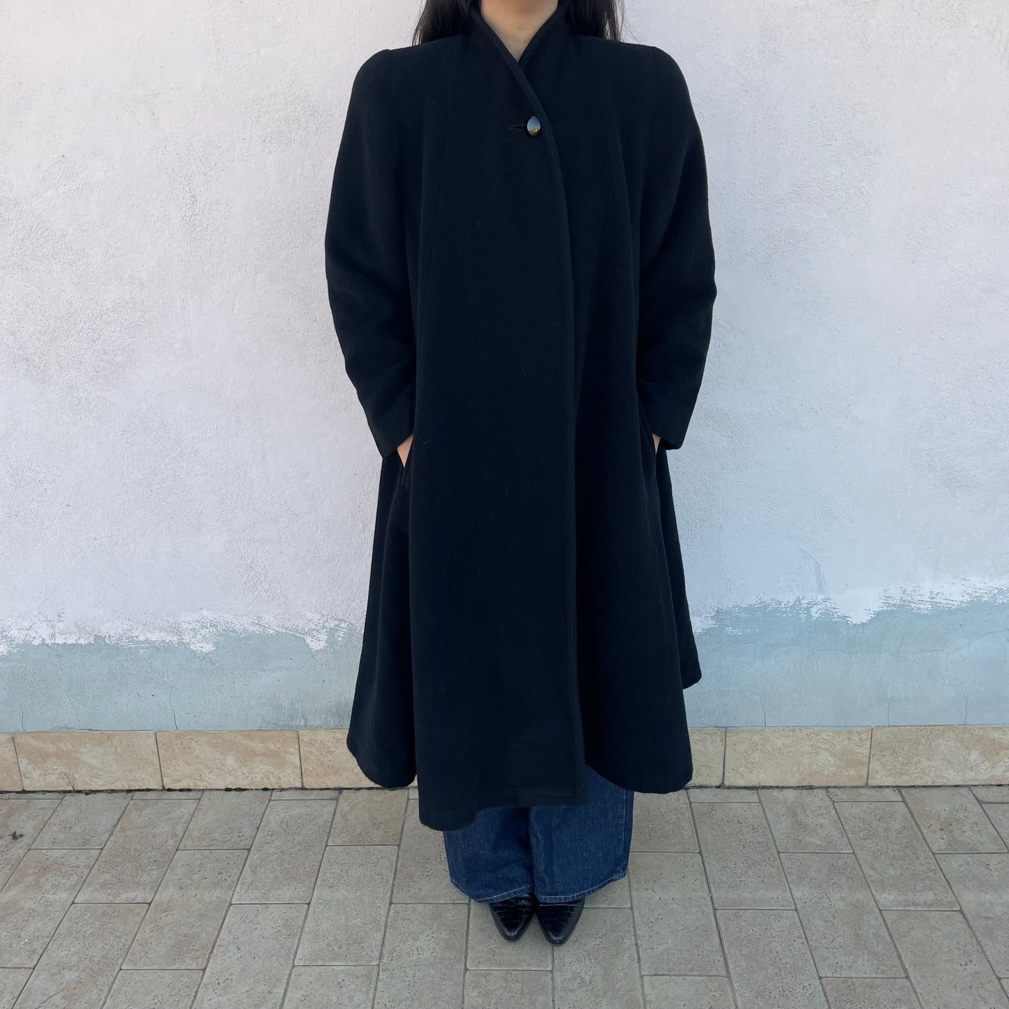 Cappotto nero ruota