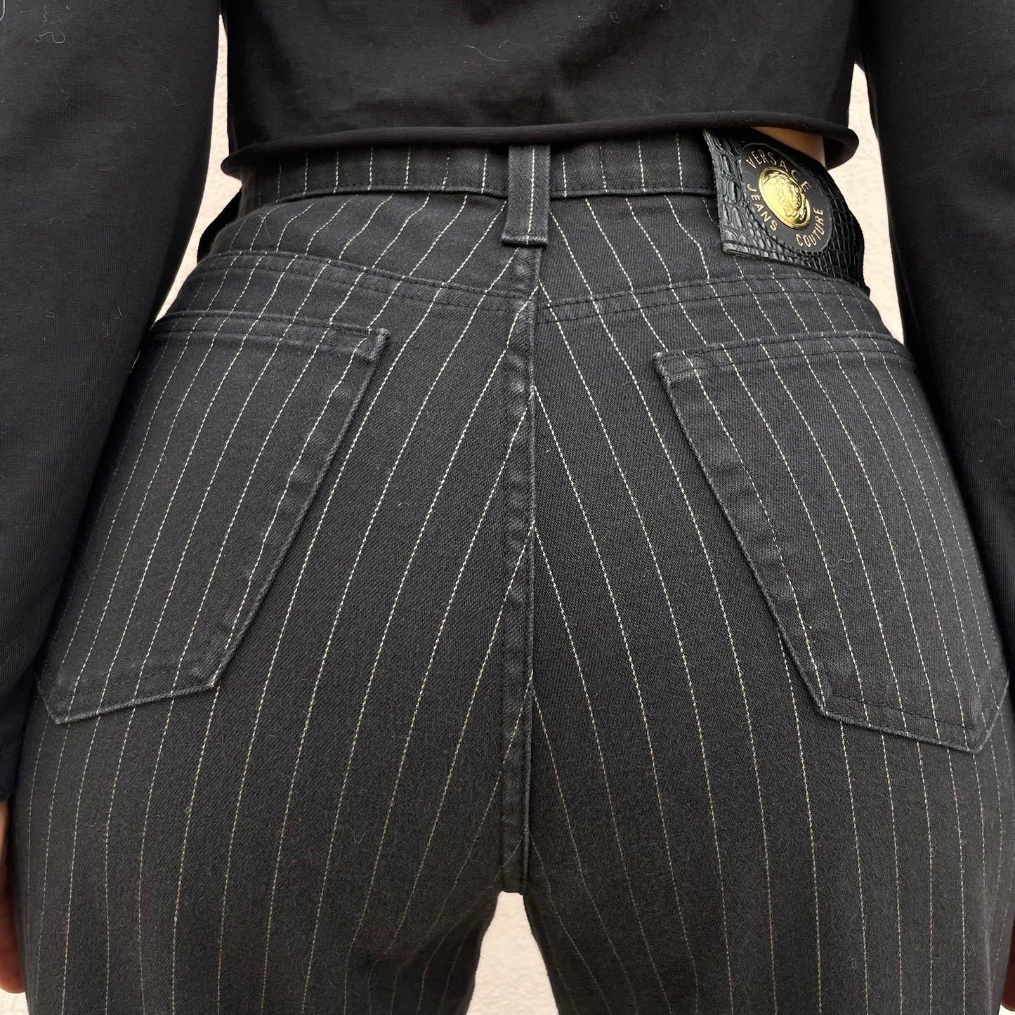 Jeans gessati Versace