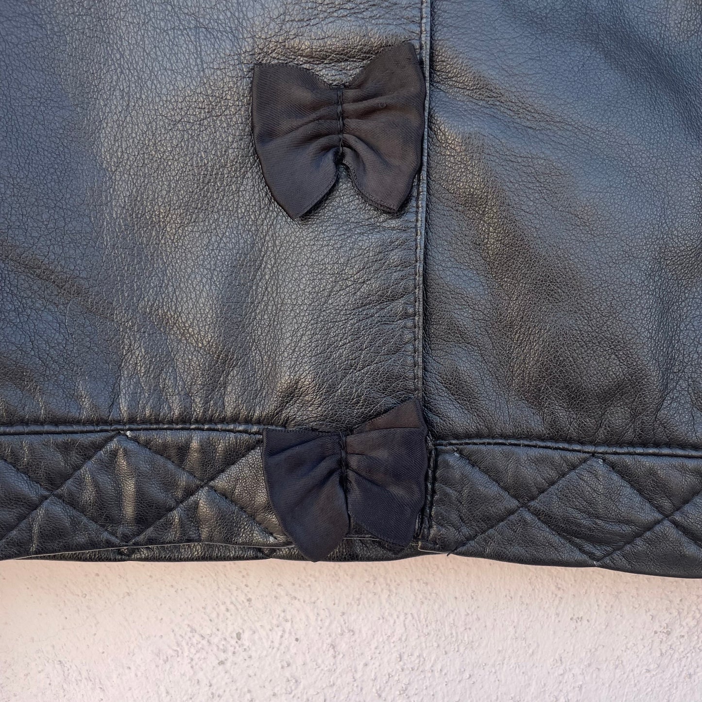 Giacca pelle cropped fiocco
