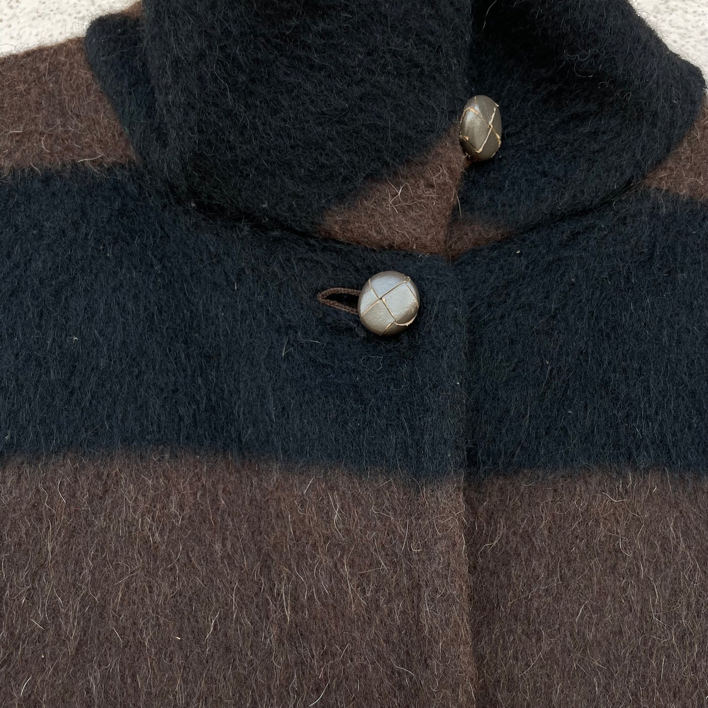 Cappotto marrone e nero