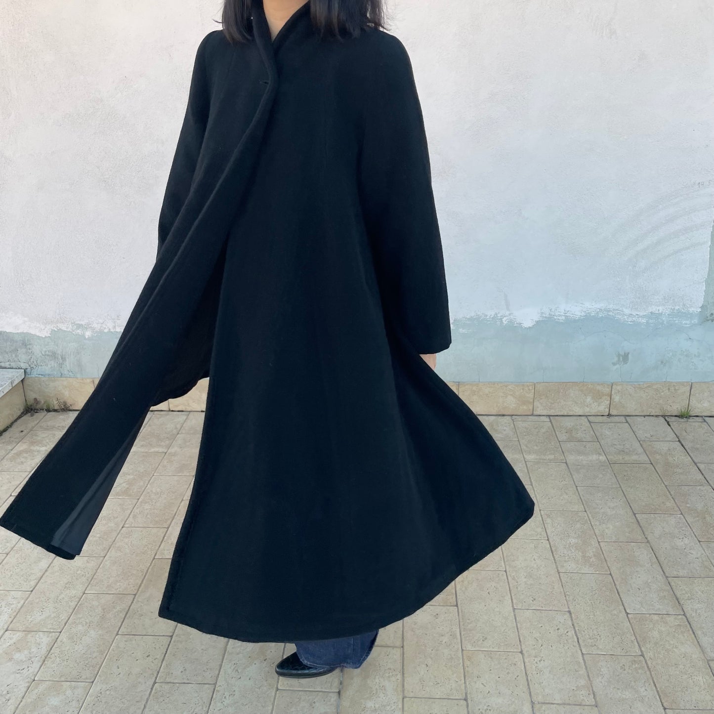 Cappotto nero ruota