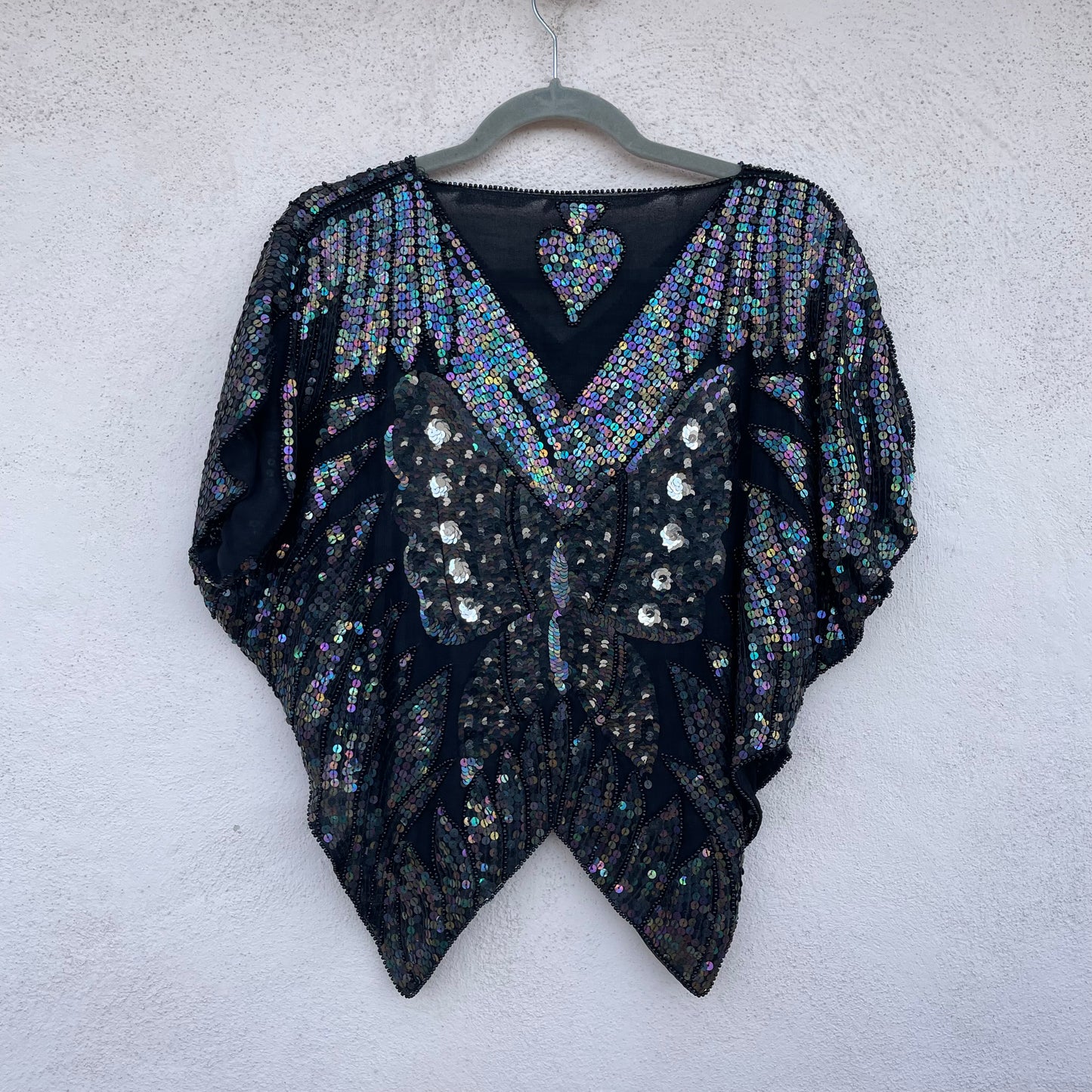 Top paillettes farfalla