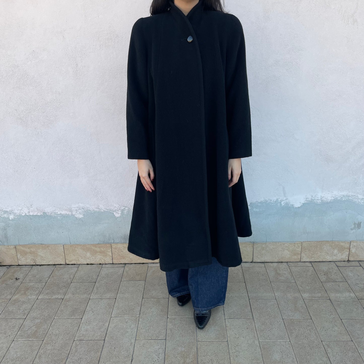 Cappotto nero ruota