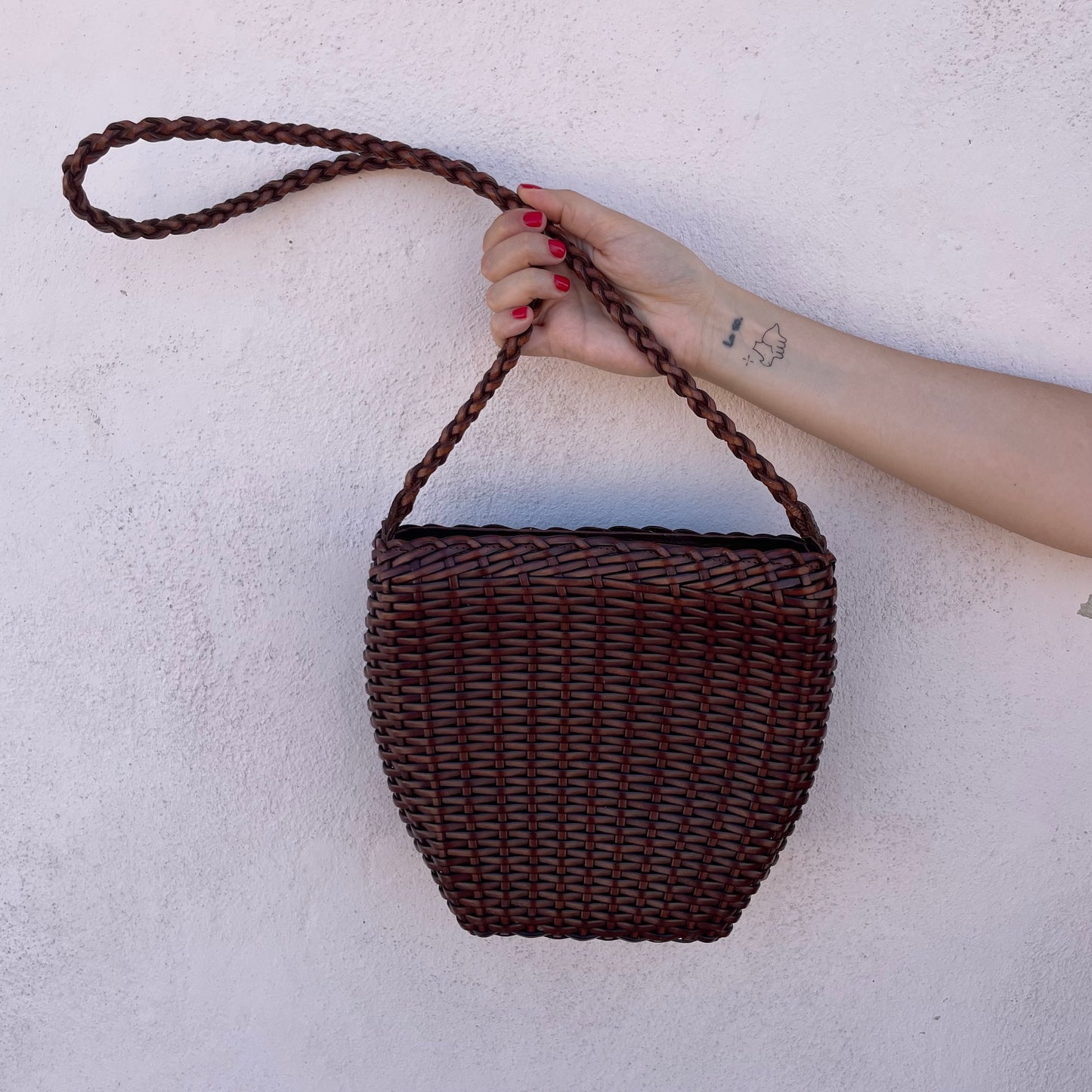 Borsa intrecciata pelle