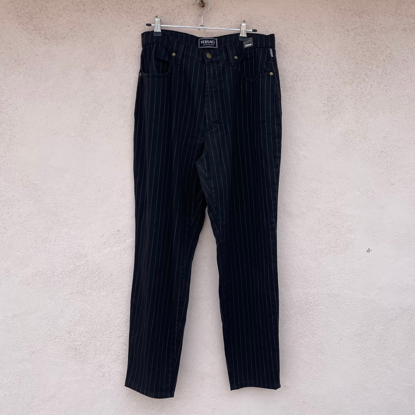 Jeans gessati Versace
