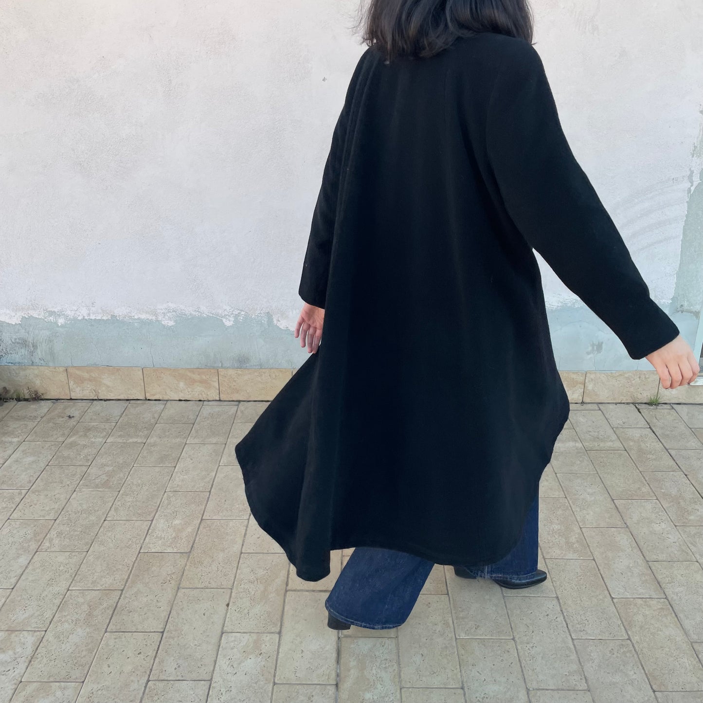 Cappotto nero ruota