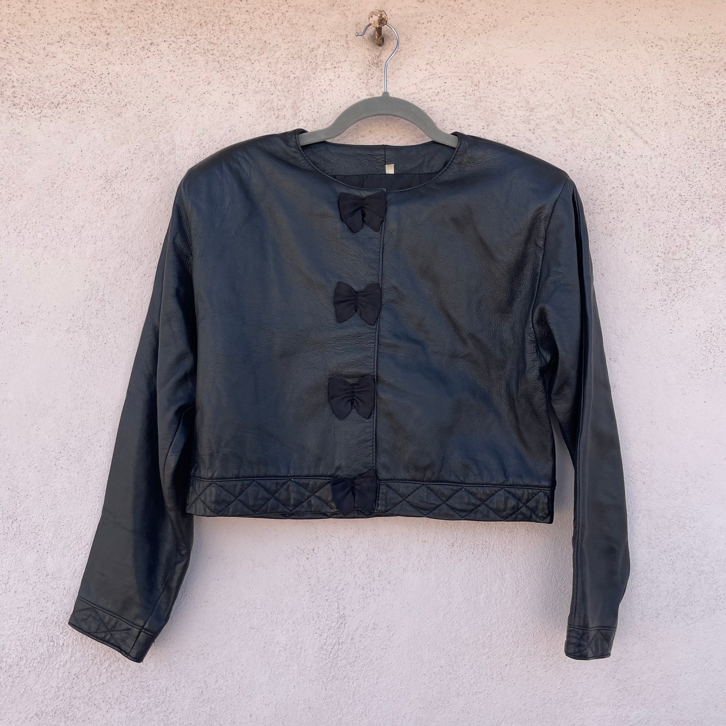 Giacca pelle cropped fiocco