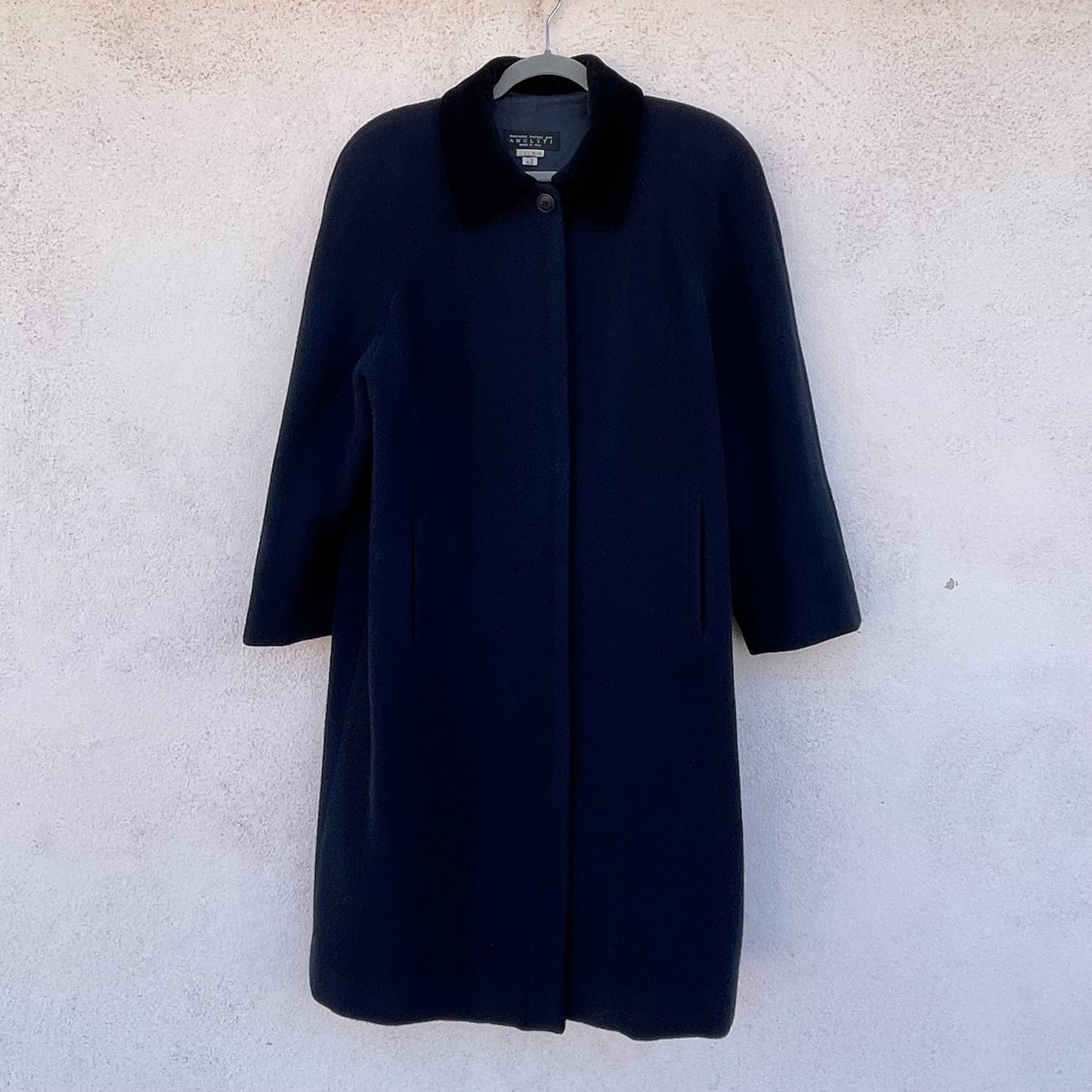 Cappotto blu Amuleti